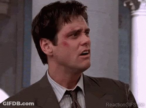 Man In Suit And Tie With Bruise GIF