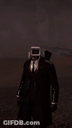 Man In Suit And Tie With Camera Head GIF