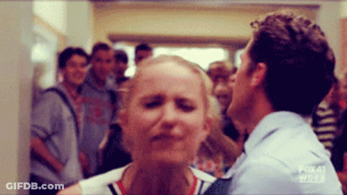 Man In Suit And Tie With Cat Blowing Bubble Gum GIF