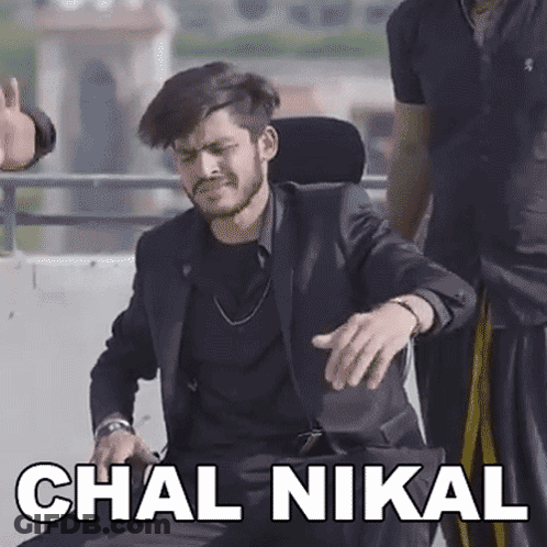 Man In Suit And Tie With Chal Nikal GIF