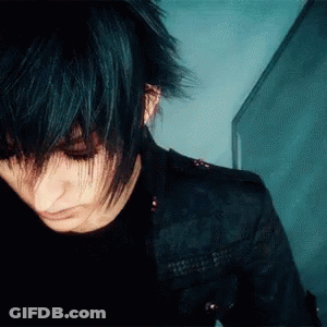 Man In Suit And Tie With Coffee At Table GIF
