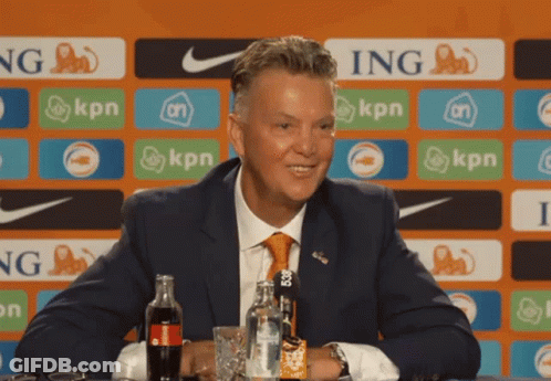 Man In Suit And Tie With Coke GIF