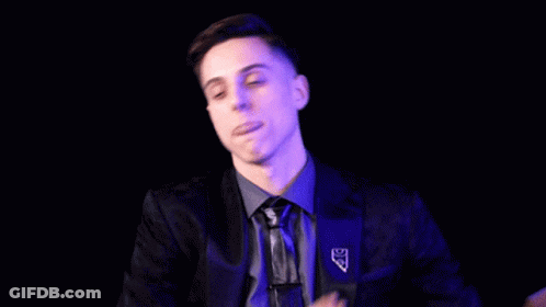 Man In Suit And Tie With DS Pin GIF