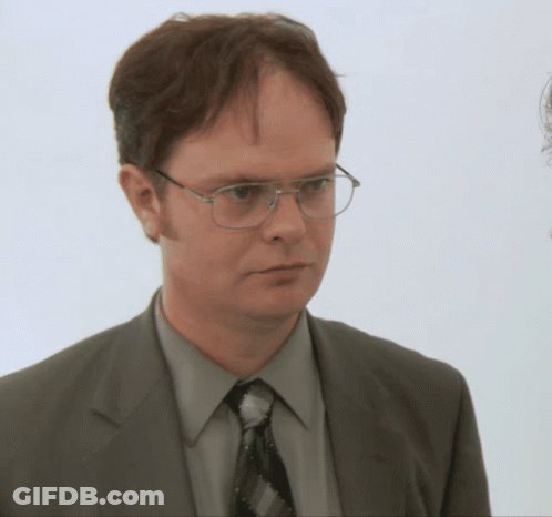 Man In Suit And Tie With Glasses GIF