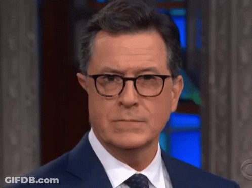 Man In Suit And Tie With Glasses GIF