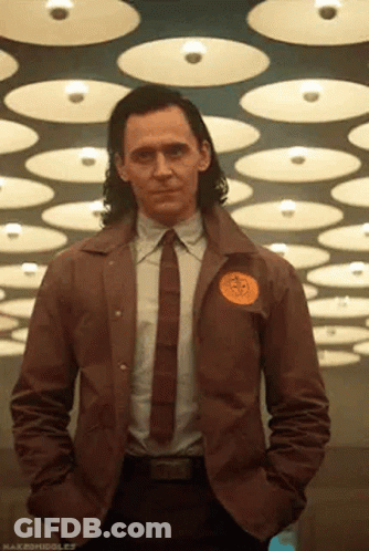 Man In Suit And Tie With Hands In Pockets GIF