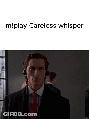 Man In Suit And Tie With Headphones Saying M!Play Careless Whisper GIF