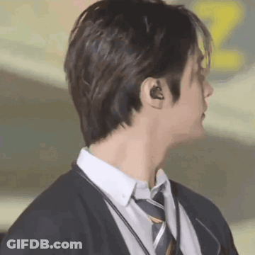 Man In Suit And Tie With Headphones GIF