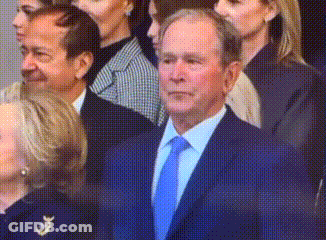 Man In Suit And Tie With Hillary Clinton And Group GIF