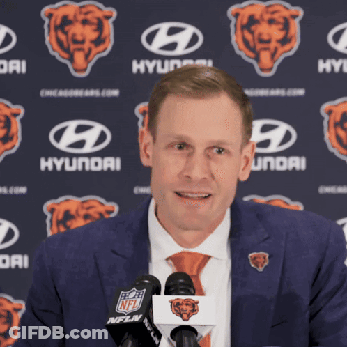 Man In Suit And Tie With Hyundai Bears GIF