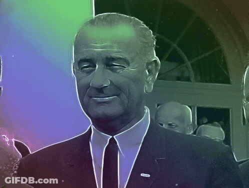 Man In Suit And Tie With Johnson Pin GIF