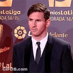 Man In Suit And Tie With Laliga Sign GIF