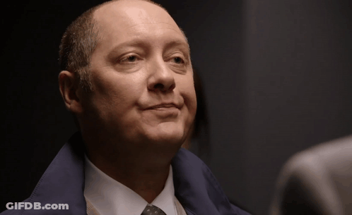 Man In Suit And Tie With Letter EE GIF