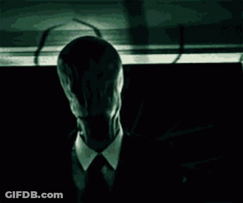 Man In Suit And Tie With Long Face GIF