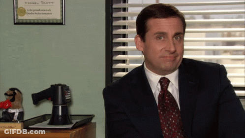 Man In Suit And Tie With Michael Scott Certificate GIF