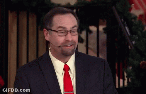 Man In Suit And Tie With Microphone GIF