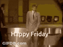Man In Suit And Tie With Microphone Happy Friday GIF