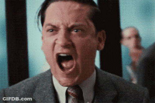Man In Suit And Tie With Open Mouth GIF
