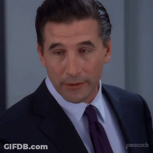 Man In Suit And Tie With Peacock GIF