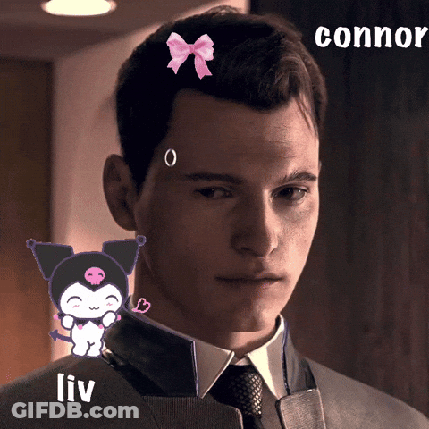 Man In Suit And Tie With Pink Bow And Liv GIF