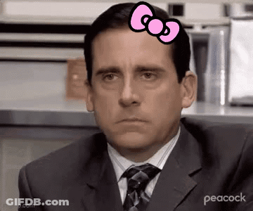 Man In Suit And Tie With Pink Bow On Head GIF