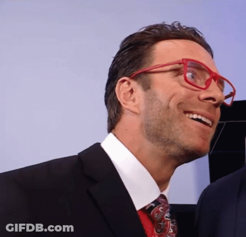 Man In Suit And Tie With Red Glasses GIF