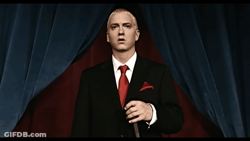 Man In Suit And Tie With Red Pocket Square GIF