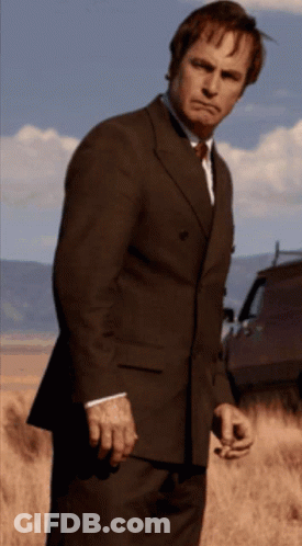 Man In Suit And Tie With Ribbon GIF