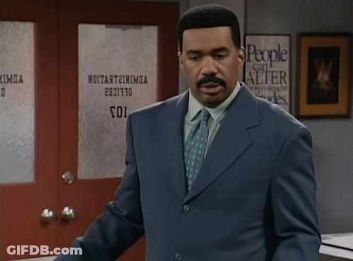 Man In Suit And Tie With Sign Saying People Can Alter GIF