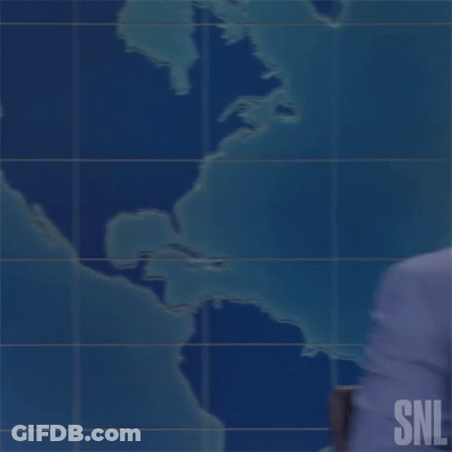 Man In Suit And Tie With SNL Logo GIF