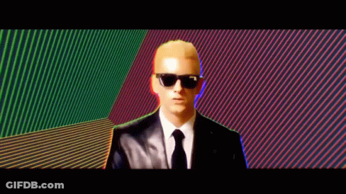 Man In Suit And Tie With Sunglasses GIF
