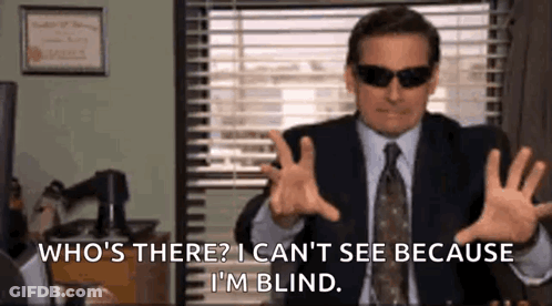 Man In Suit And Tie With Sunglasses Talking GIF
