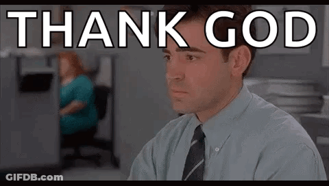 Man In Suit And Tie With Thank God On Screen GIF