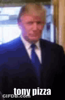 Man In Suit And Tie With Tony Pizza GIF