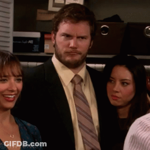 Man In Suit And Tie With Two Women GIF