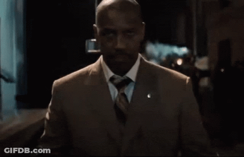 Man In Suit And Tie With U.S. Army Button GIF