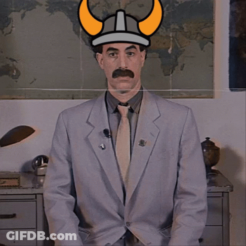 Man In Suit And Tie With Viking Hat GIF