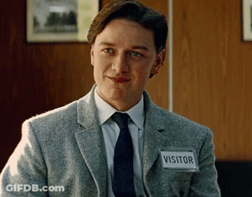 Man In Suit And Tie With Visitor Name Tag GIF