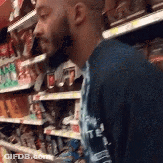 Man In Suit And Tie With Woman In White Shirt GIF