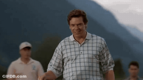Man In Suit And Tie With Your Fired Above Him GIF