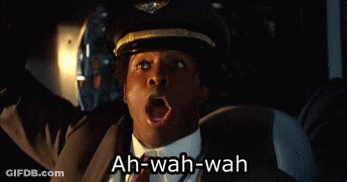 Man In Suit And Tie Yawning GIF