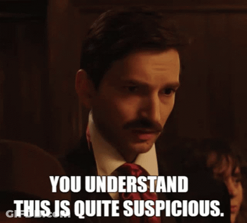 Man In Suit And Tie You Understand This Is Quite Suspicious GIF