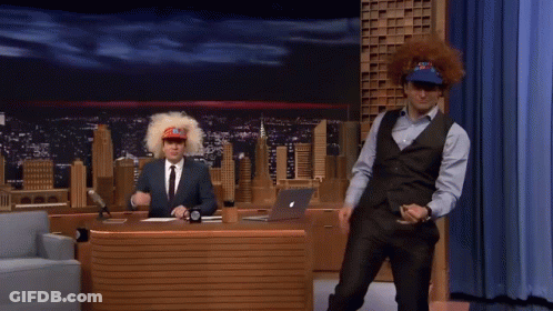 Man In Suit And Vest Dancing At Microphone GIF