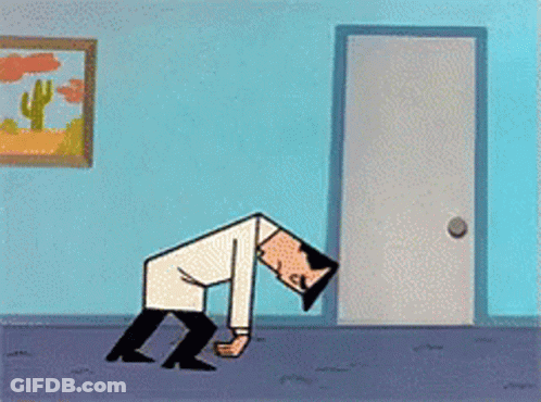 Man In Suit And Woman In Front Of The Wall GIF