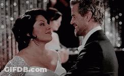Man In Suit And Woman In Wedding Dress Dancing GIF