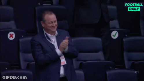 Man In Suit Applauding In Stadium GIF