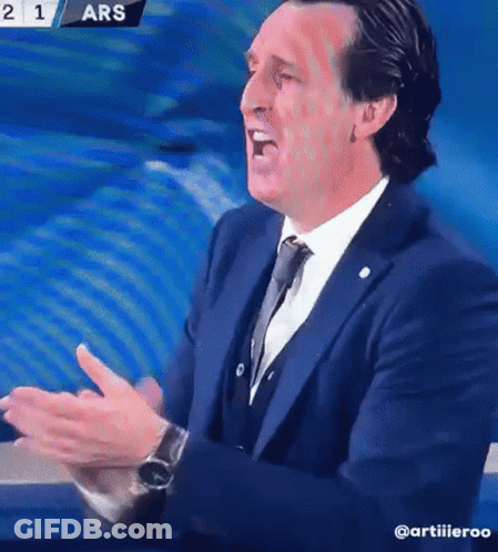 Man In Suit Applauding On TV Screen GIF
