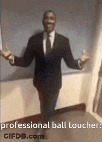 Man In Suit Arms Outstretched Says Professional Ball Toucher GIF
