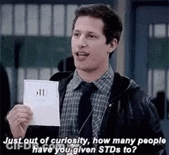 Man In Suit Asking How Many People Have STDs GIF