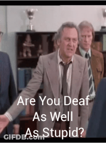 Man In Suit Asking If He Is Deaf GIF
